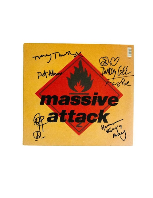 Disco autografiado por Massive Attack Idolos