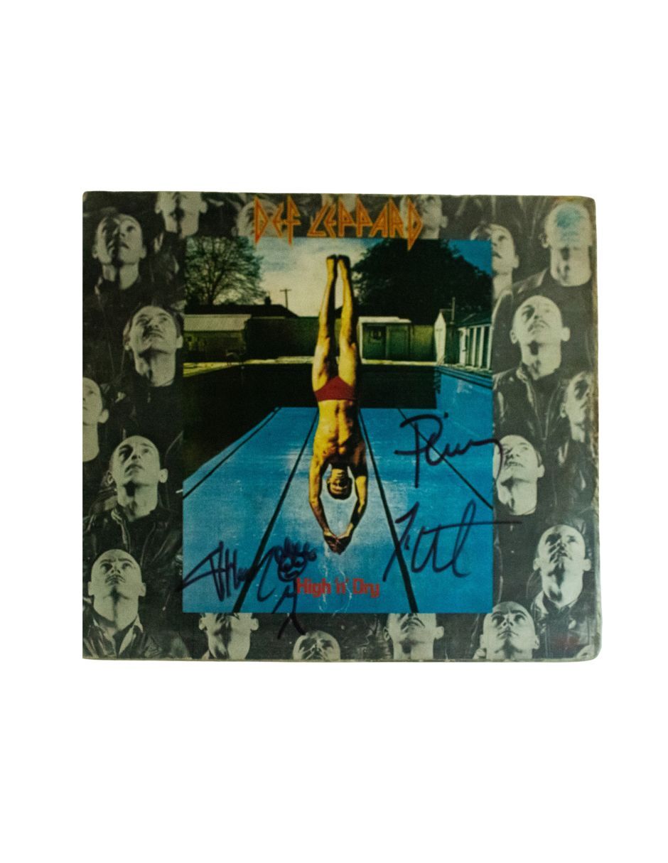 Disco de Vinilo autografiado por Def Leppard Disco de Vinilo autografiado por Def Leppard