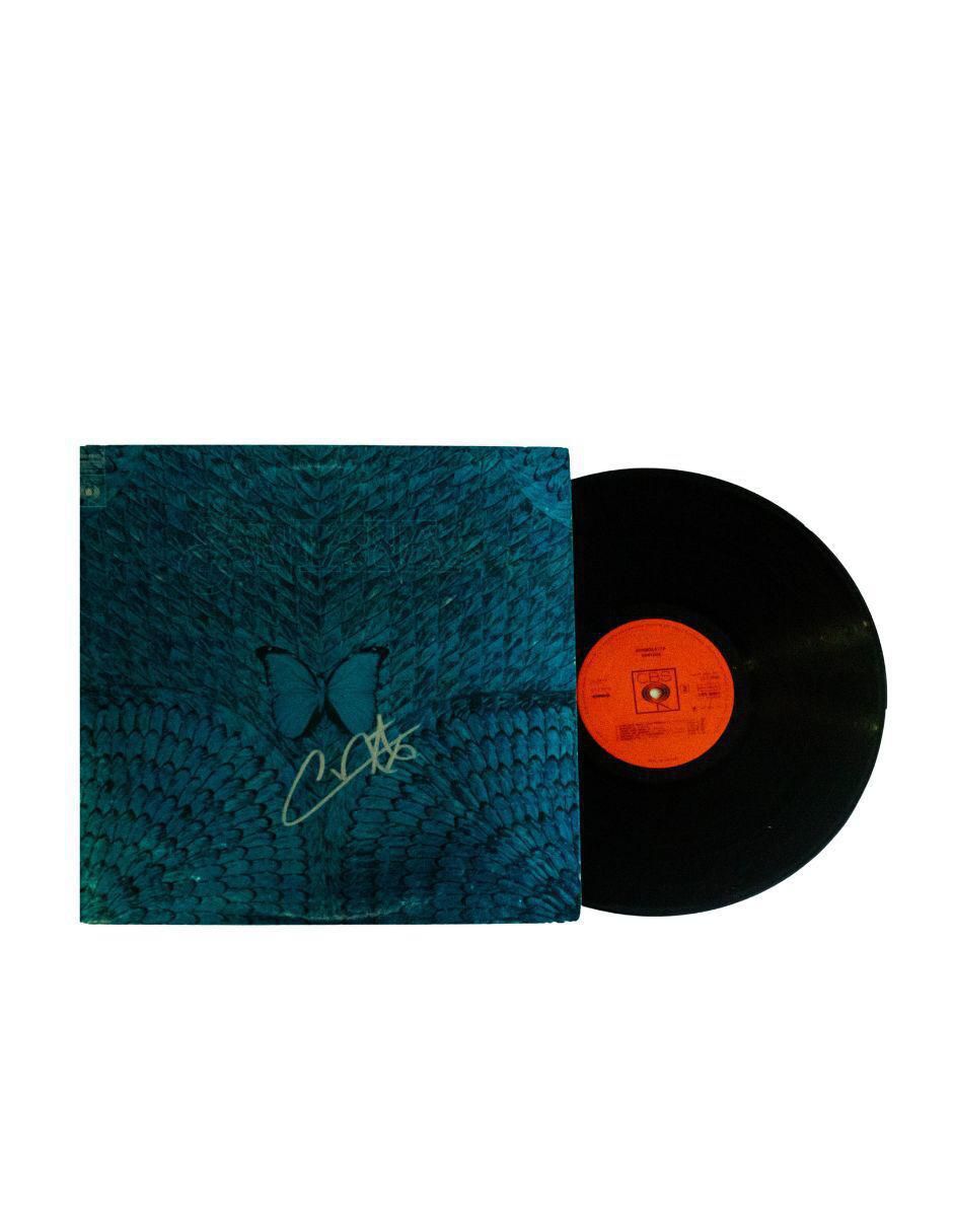 Disco de vinilo autografiado por Santana 2