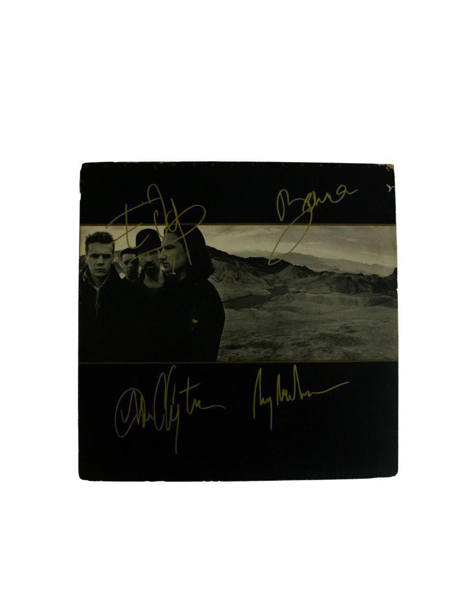 Disco de vinilo autografiado por U2 Disco de vinilo autografiado por U2